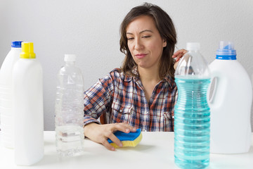 Woman and cleaning products