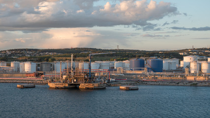 Jetty of LPG LNG marine terminal in sunset