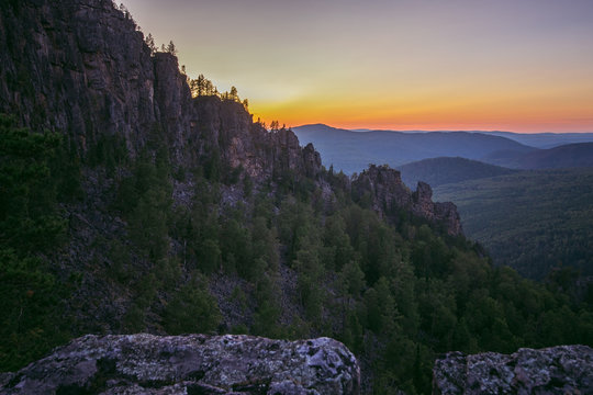 Beautiful landscape of sunset behind the mountains, Russia, Ural, Bashkortostan, Aygir, mountain range Karatash.