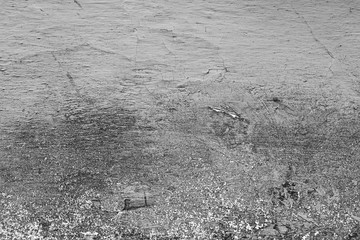 Wall fragment with scratches and cracks