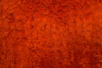 Abstract red luxury velvet background. Velvet plush soft deluxe texture