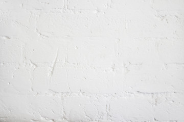 White brick wall textured background.