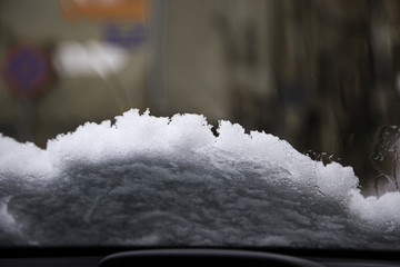 Snow on windshield wipers