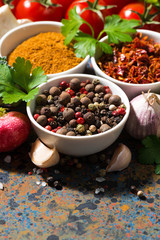 assortment of spices and fresh organic vegetables, vertical
