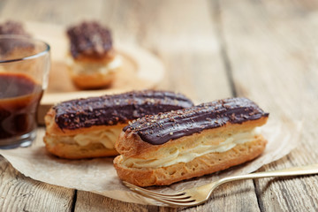 Traditional french eclairs with chocolate.