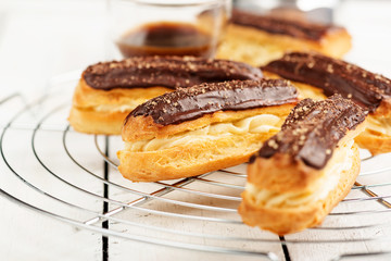 Traditional french eclairs with chocolate.