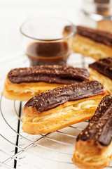 Traditional french eclairs with chocolate.