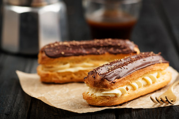 Traditional french eclairs with chocolate.