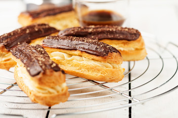 Traditional french eclairs with chocolate.