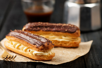 Traditional french eclairs with chocolate.