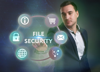 Business, Technology, Internet and network concept. Young businessman working on a virtual screen of the future and sees the inscription: File security