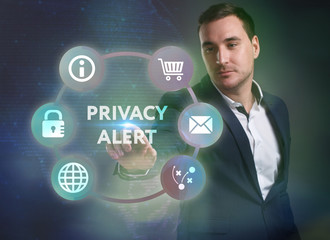Business, Technology, Internet and network concept. Young businessman working on a virtual screen of the future and sees the inscription: Privacy alert