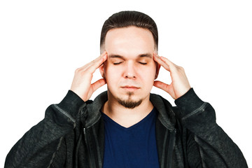 Naklejka premium Worried bearded young man suffering from headache