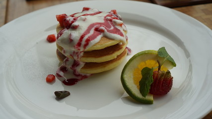 Stack of american pancake with strawberry