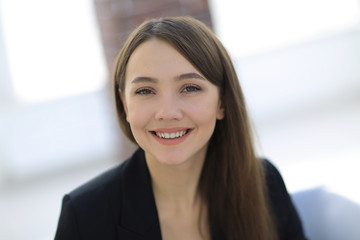 close up portrait of young  business woman in modern office