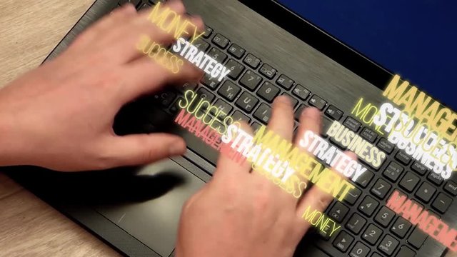 Caucasian man hands rapidly typing on laptop keyboard. Terms about business and finance fly away. Real video enhanced with 3d text animation.