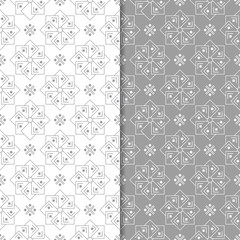 White and gray floral backgrounds. Set of seamless patterns