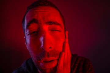 Sweating man having toothache