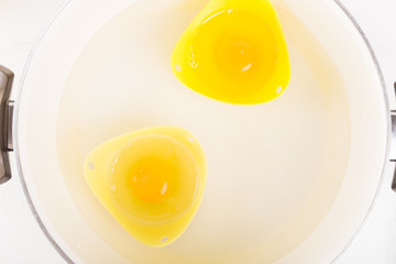 Silicone Egg Poachers with Eggs