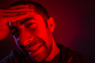 Man is suffering in pain from headache