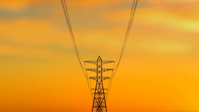 An arty 3d rendering of high cribriform electricity towers approaching quickly as a result of the dolly in effect. The background is dark yellow. It looks like a summer sunset.
