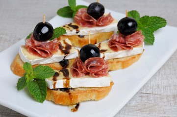 Snack with   Cheese Brie  and salami