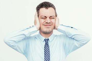 Tensed Middle-aged Business Man Covering Ears