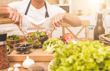 Chef man cooking in the kitchen