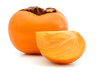 Ripe persimmons on white background.