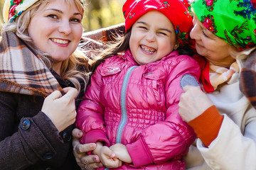 mother and the daughter in a color knitted scarf,Russian scarfs on mother and daughter