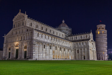 Fototapeta na wymiar Night view of Leaning Tower of Pisa (Torre di Pisa) and Cathedral on Piazza dei Miracoli in Pisa, Tuscany, Italy.
