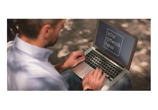 Laptop User Outdoors Mockup 1
