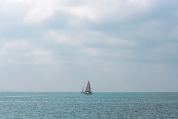 A small sailboat in the sea