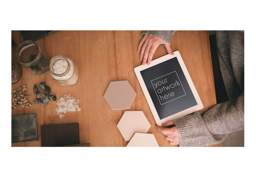 Tablet User with Interior Design Materials Mockup 1