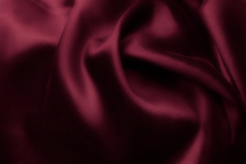 Elegant red satin silk with waves, abstract background