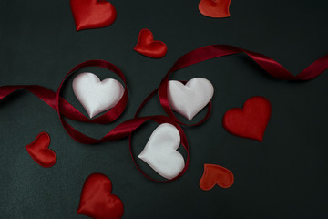 ribbon with hearts on a black background