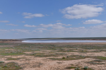 muddy shores of small salt lake in steppe between Kalmykia and Astrakhan