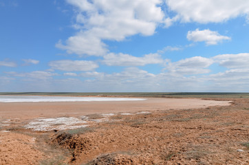 muddy shores of small salt lake in steppe between Kalmykia and Astrakhan