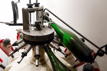 Historic bottling machine from the end of the XIX century in an old wine cellar of Langhe (Piedmont, Italy)