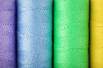 Background of colourful thread spools