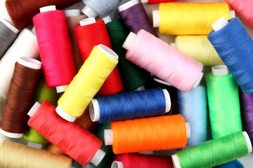 Background of colourful thread spools