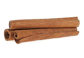 Three cinnamon sticks isolated on white background
