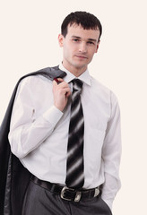 Portrait of a handsome business man isolated on white.