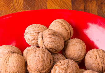 walnuts in red plate