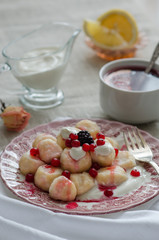 Gnocchi with yogurt, red currant jam and berries