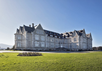 Beautiful shot of XIX Century eclectic style palace at natural environment surrounded by green...