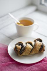 vertically background with cup of tea and chocolate cake
