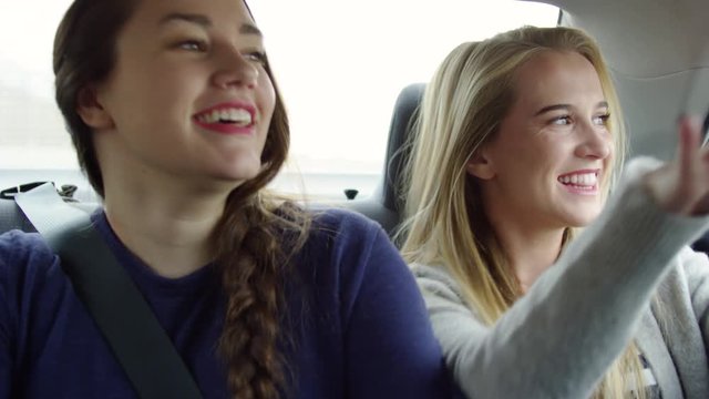 Funny Young Women Dance And Sing Together In Back Seat Of Moving Car - Shot On Red Scarlet-W Dragon In 4K/Slow Motion