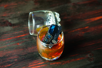 Alcohol behind the wheel. Harmful and dangerous.