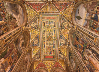 Amazing interior of Siena cathedral of Saint Mary Assumption, Piccolomini Library in Tuscany, Italy